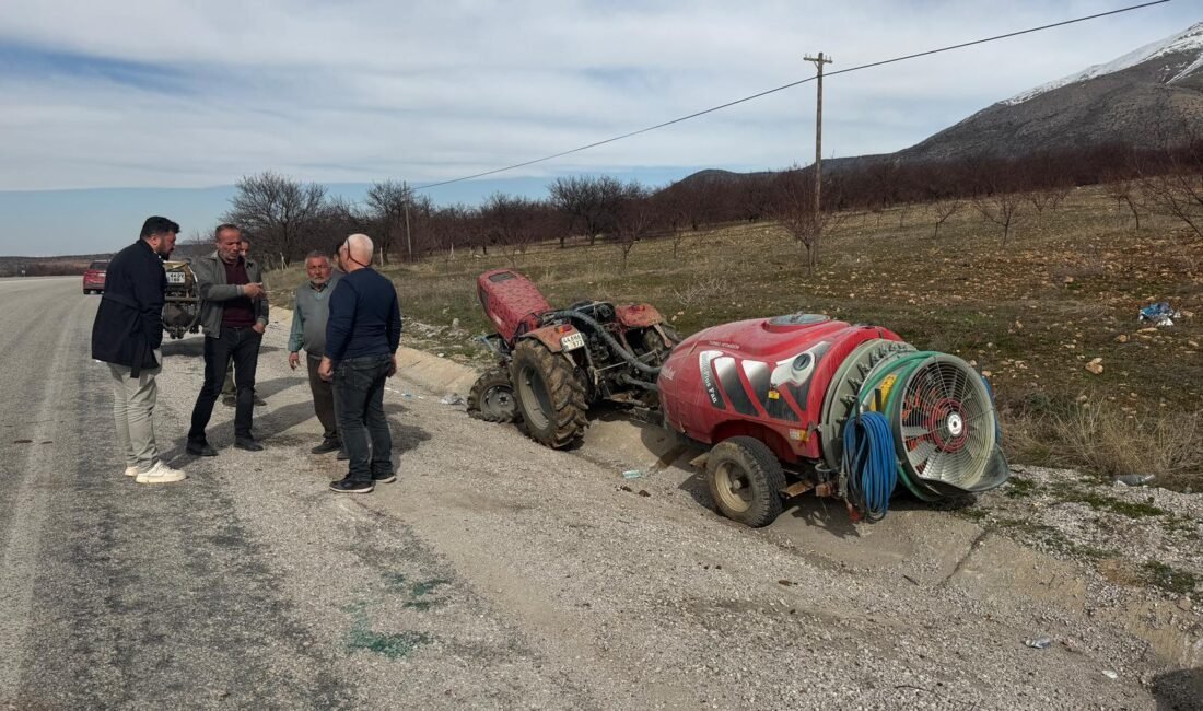 Kadir AYDIN/MALATYA, (DHA)- MALATYA'nın Doğanşehir ilçesinde lastiği patlayıp, devrilen traktördeki