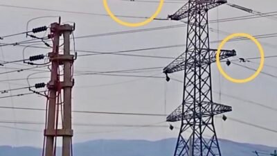 İbrahim EMÜL/OSMANİYE, (DHA)- OSMANİYE’de 2 işçi, metrelerce yükseklikte yüksek gerilim